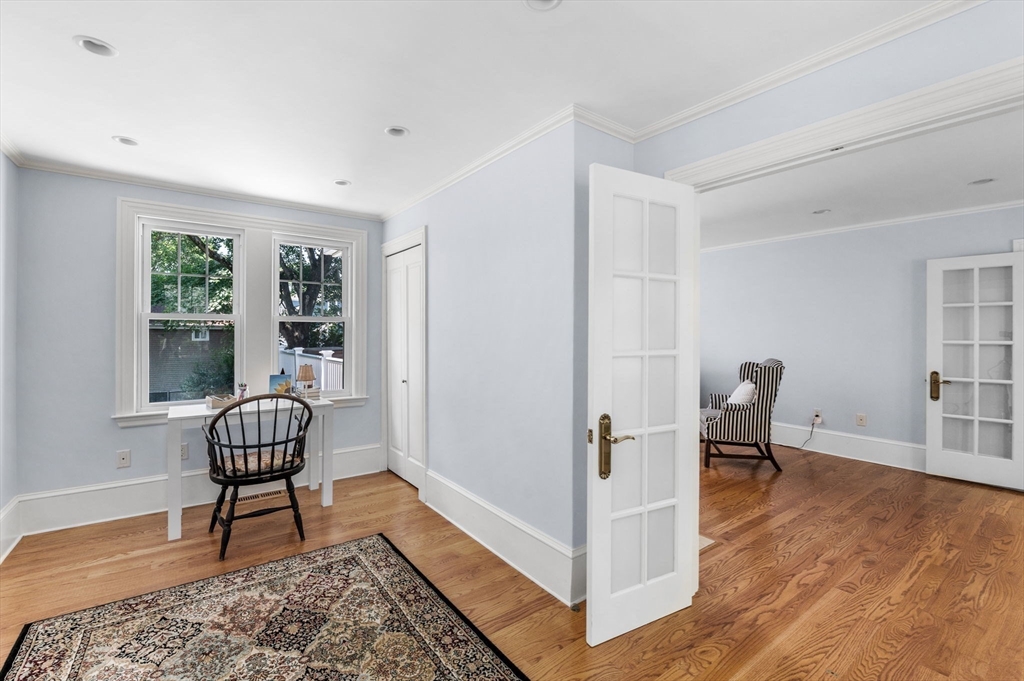 22 Robbins Road Watertown, MA 02472 - Photo 12 of 30 a living room with furniture rug and a window