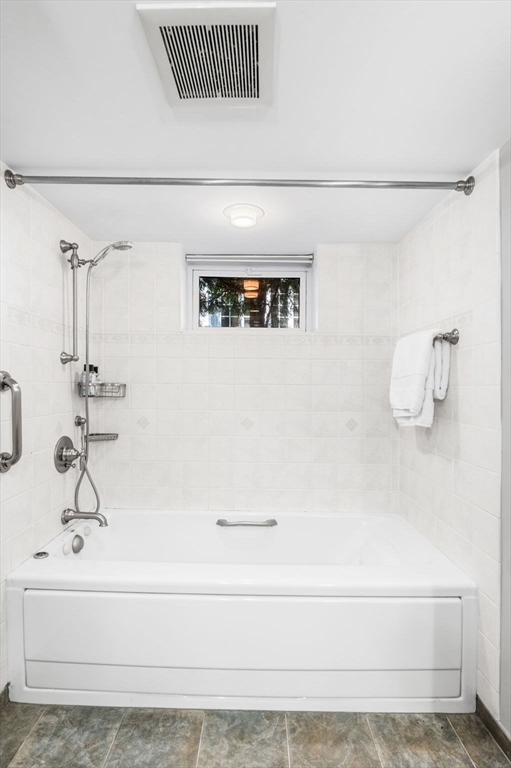 22 Robbins Road Watertown, MA 02472 - Photo 27 of 30 a bathroom with a bathtub