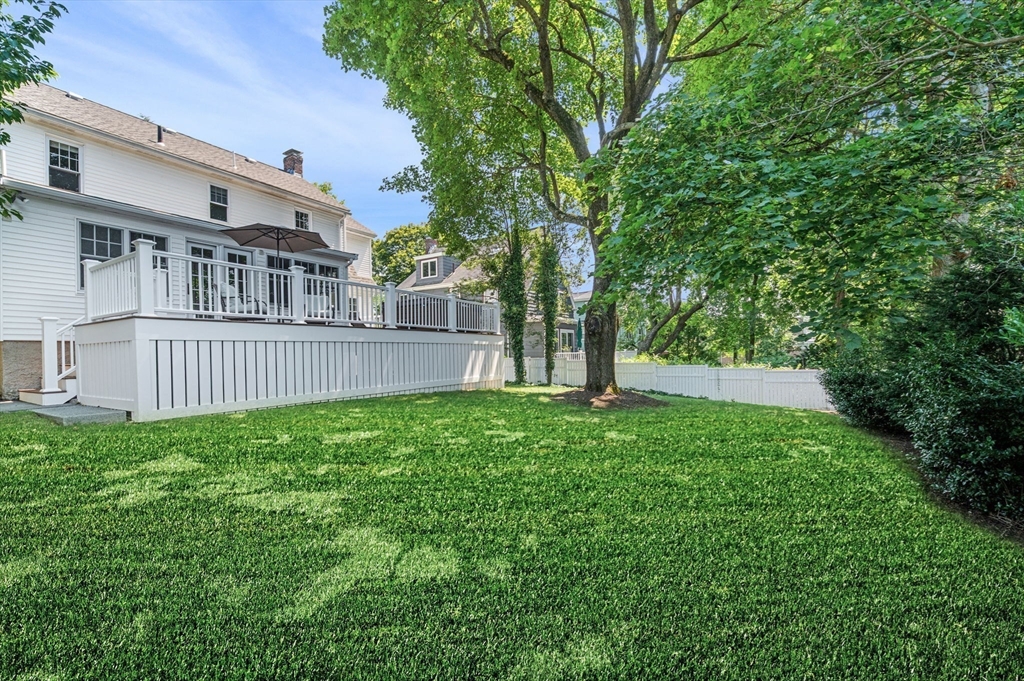 22 Robbins Road Watertown, MA 02472 - Photo 3 of 30 a view of backyard with deck and garden