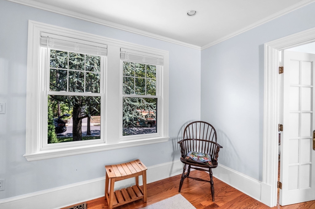22 Robbins Road Watertown, MA 02472 - Photo 9 of 30 a view of a hallway with windows and furniture