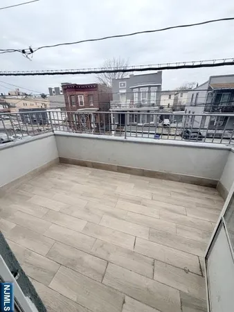 a view of balcony with city view