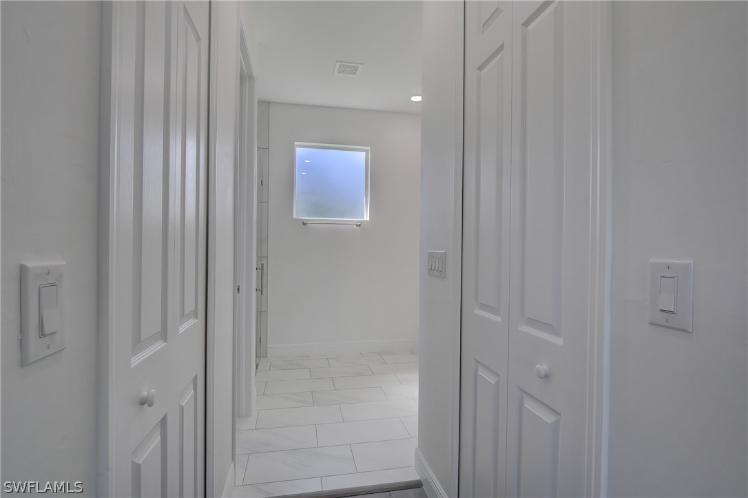 18457 Lee Road Fort Myers, FL 33967 - Photo 14 of 28 a bathroom with a shower