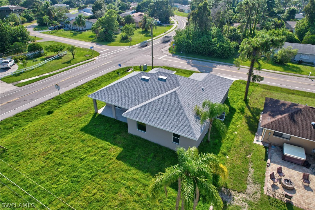 18457 Lee Road Fort Myers, FL 33967 - Photo 4 of 28 an aerial view of a house with a garden