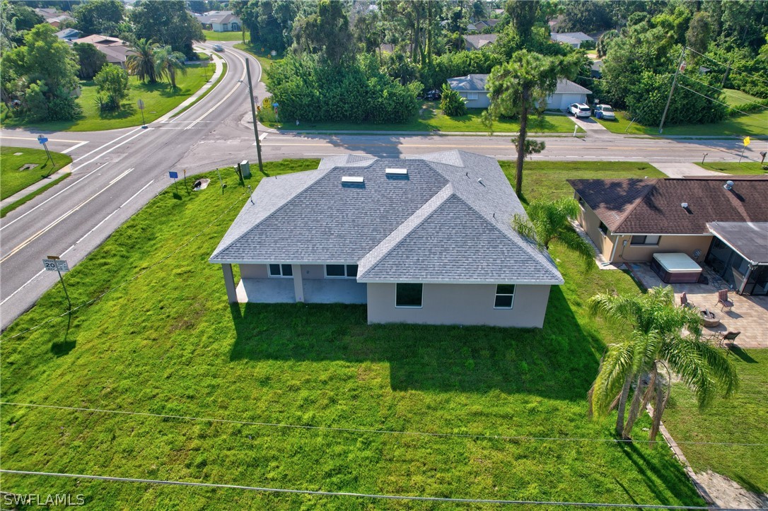 18457 Lee Road Fort Myers, FL 33967 - Photo 5 of 28 a view of a house with a park