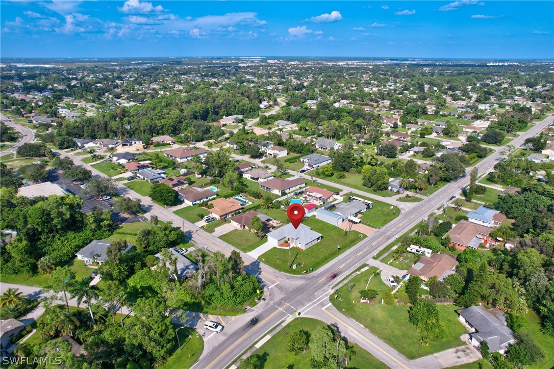 18457 Lee Road Fort Myers, FL 33967 - Photo 6 of 28 a view of city with lush green forest