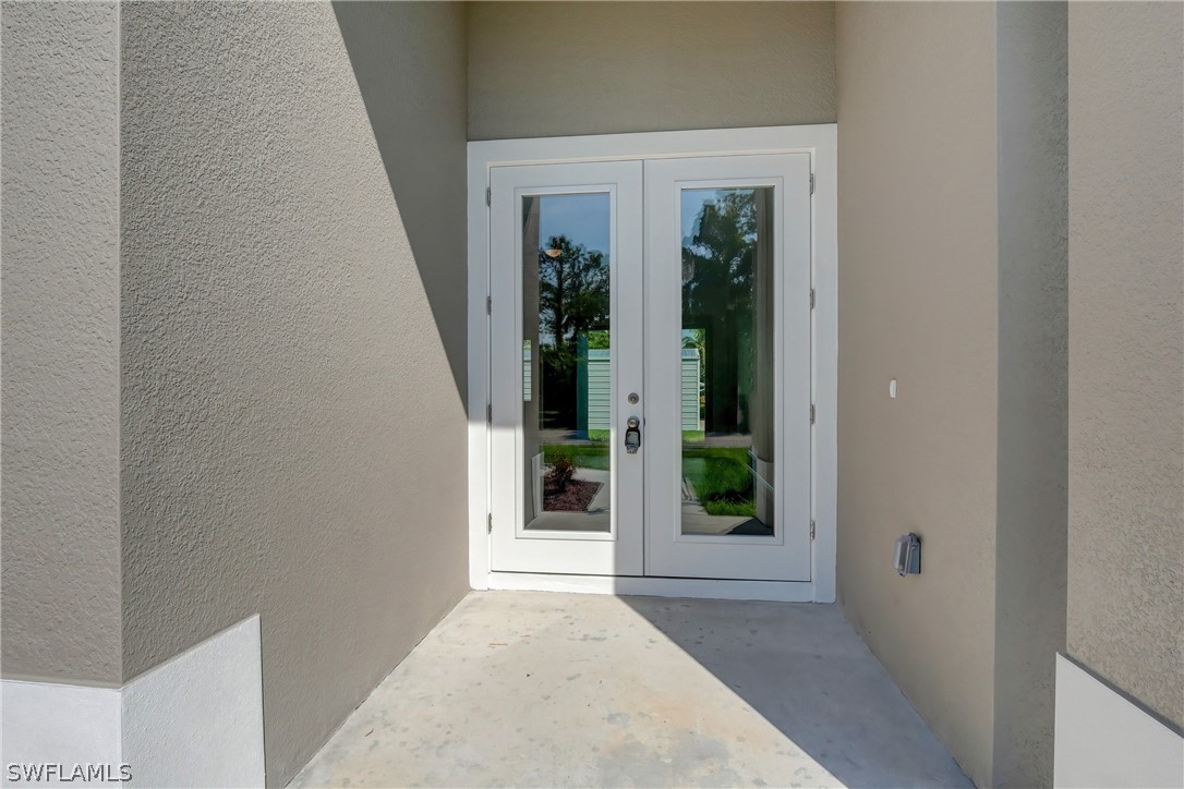 18457 Lee Road Fort Myers, FL 33967 - Photo 7 of 28 front view of a house with a window