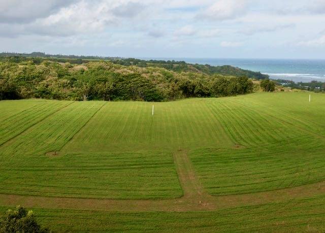56 Anini Road Princeville, HI 96722 - Photo 1 of 1 a view of an ocean from a city
