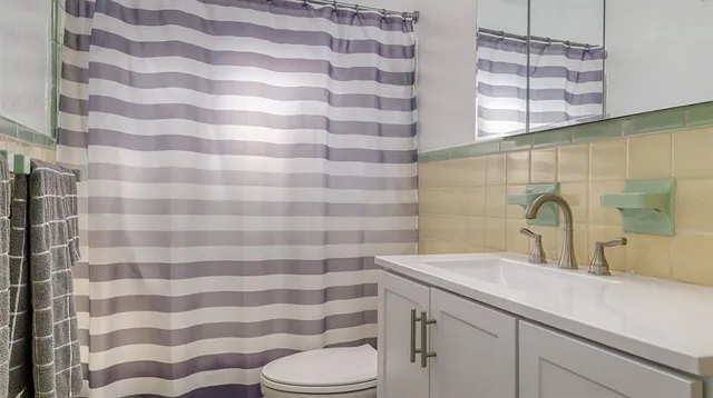 a bathroom with a sink and a toilet