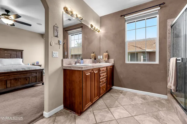 a bathroom with a sink a vanity and a mirror