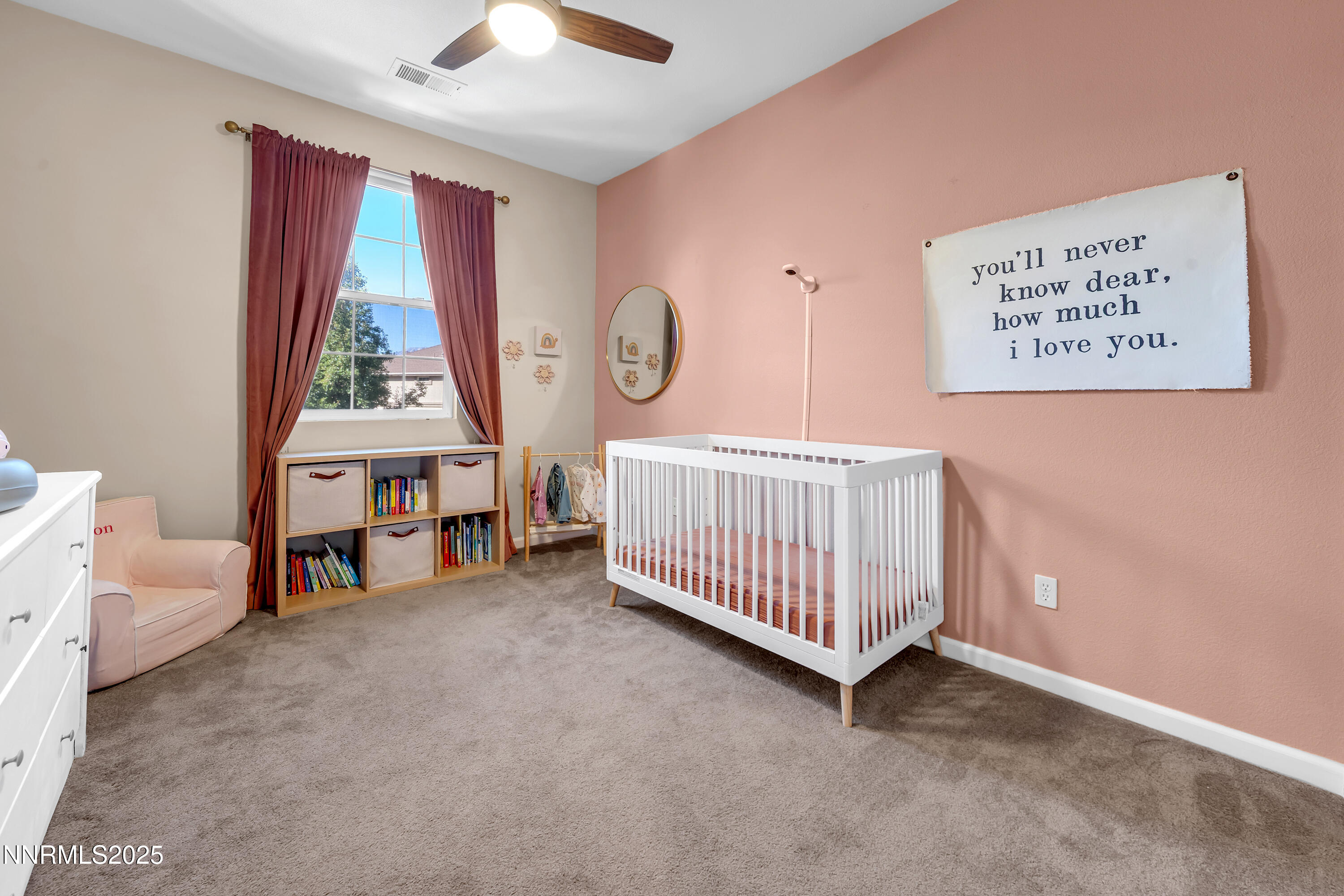1811 Stetson Drive Reno, NV 89521 - Photo 21 of 34 a view of a room with baby crib and a window