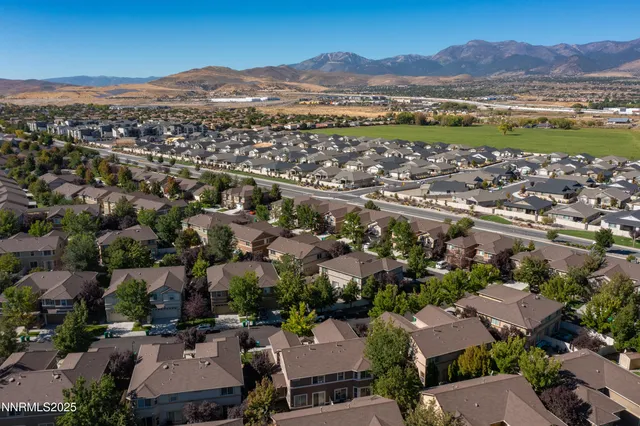an aerial view of a city with lots of residential buildings