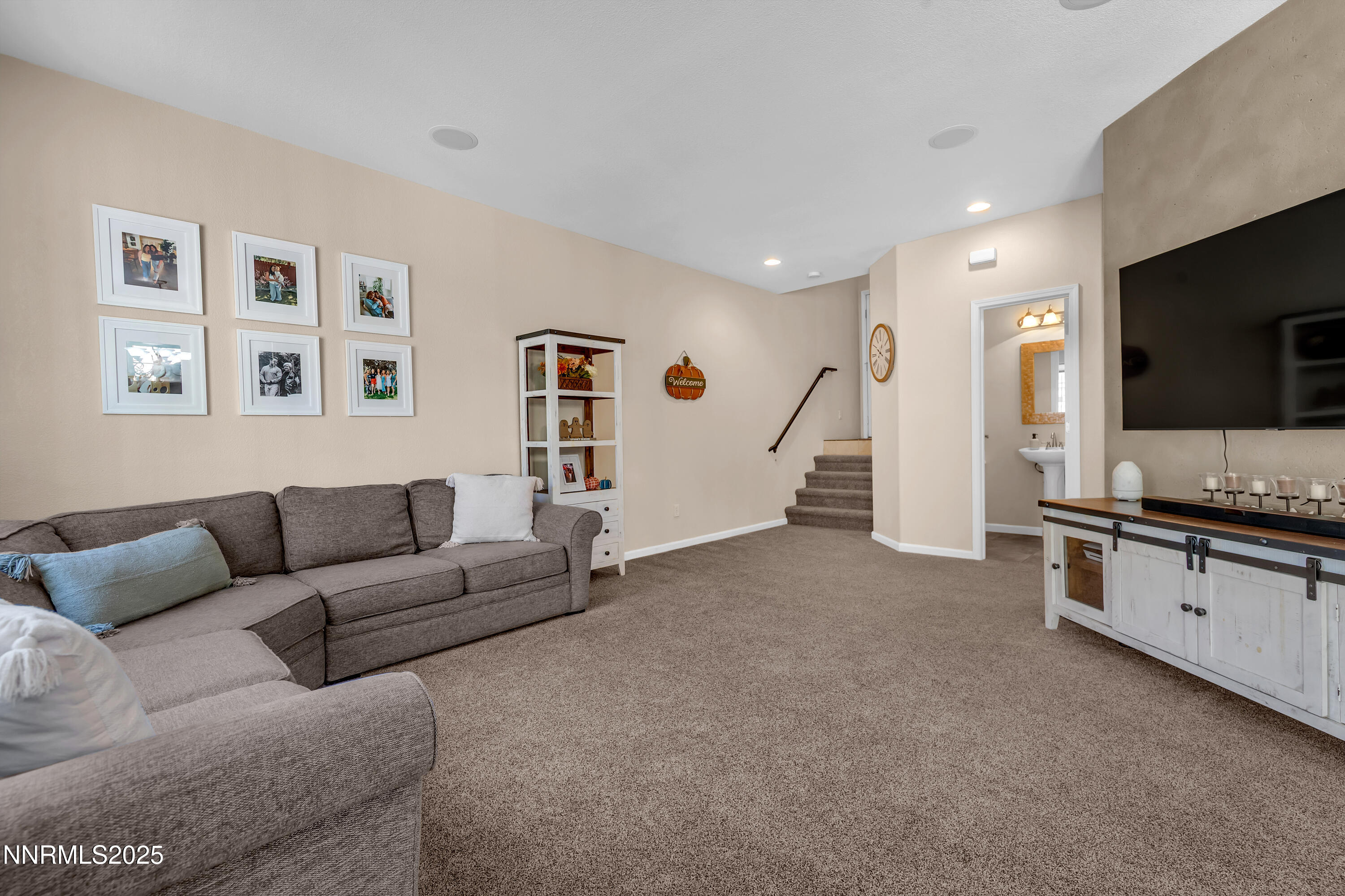 1811 Stetson Drive Reno, NV 89521 - Photo 5 of 34 a living room with furniture and a flat screen tv