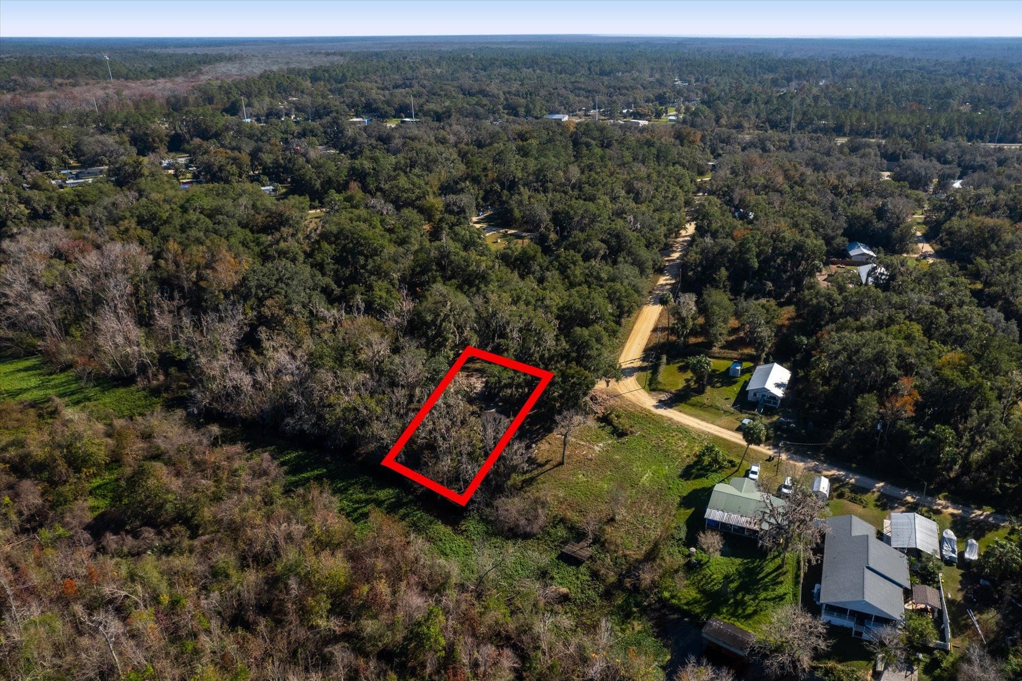 114 Ridgeline Avenue Satsuma, FL 32189 - Photo 9 of 14 an aerial view of a house with a yard and mountain