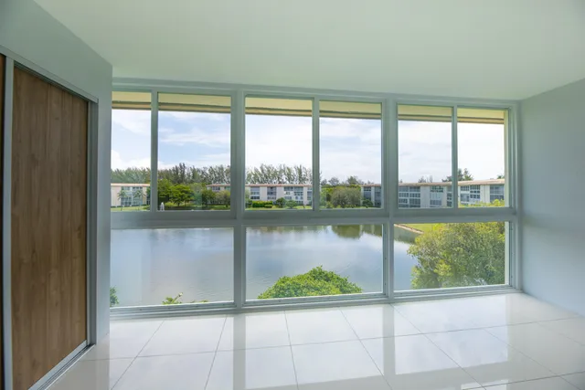 a view of a kitchen with a sink and dishwasher