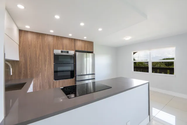 a group of people sitting in front of a building