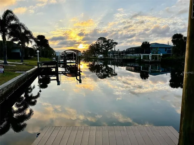 a view of a terrace with a bench in the patio
