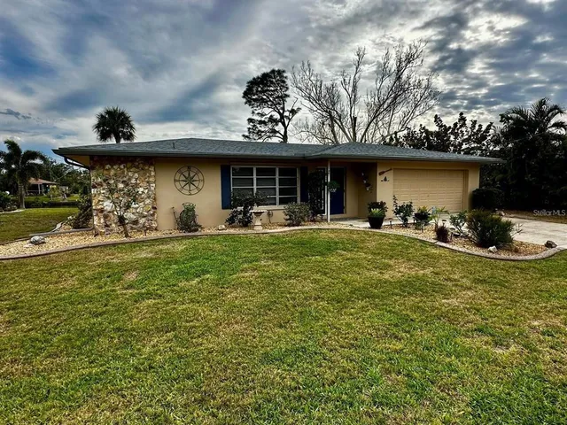 a front view of a house with patio