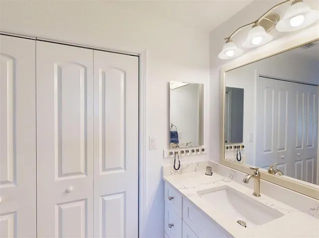 a bathroom with a toilet and a shower curtain