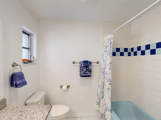 a workspace room with furniture and wooden floor