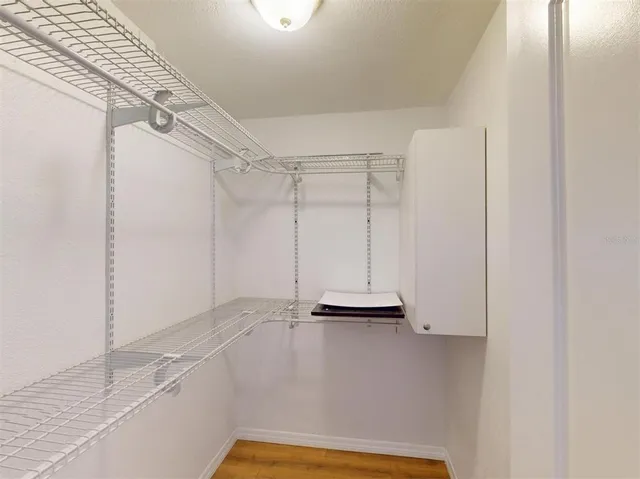 a utility room with sink dryer and washer