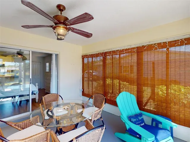 a view of a lake with a house in the background