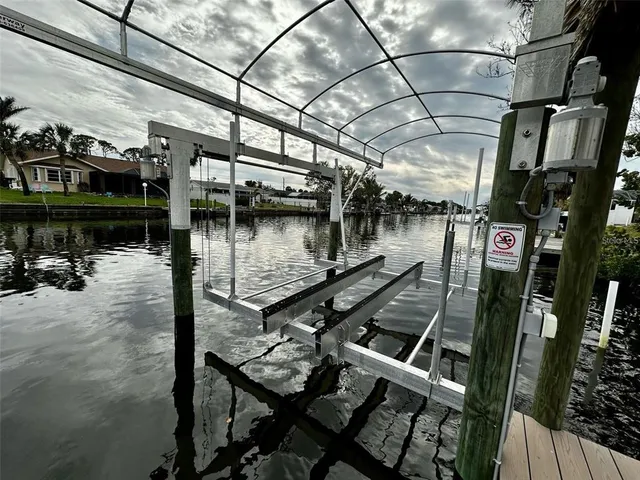 a view of a balcony with two chairs and a table