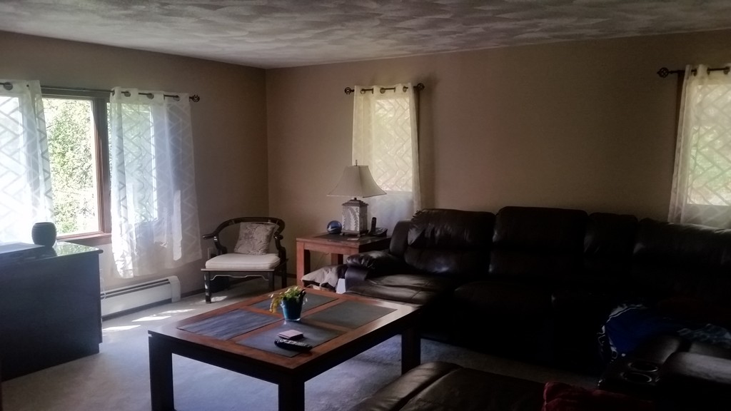 10 Ramshorn Road Sutton, MA 01590 - Photo 6 of 24 a living room with furniture and a window