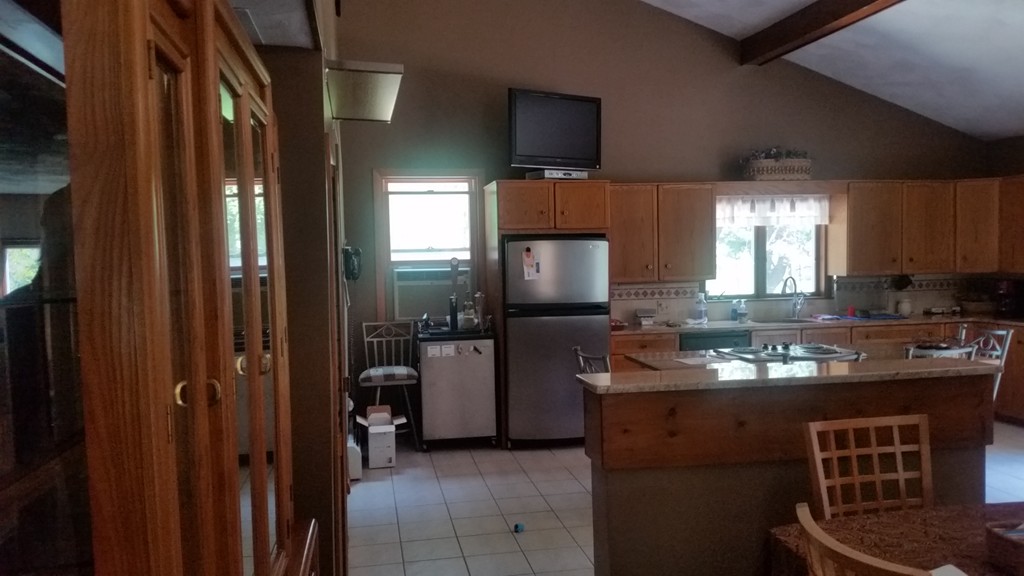 10 Ramshorn Road Sutton, MA 01590 - Photo 8 of 24 a kitchen with kitchen island stainless steel appliances a sink stove and refrigerator