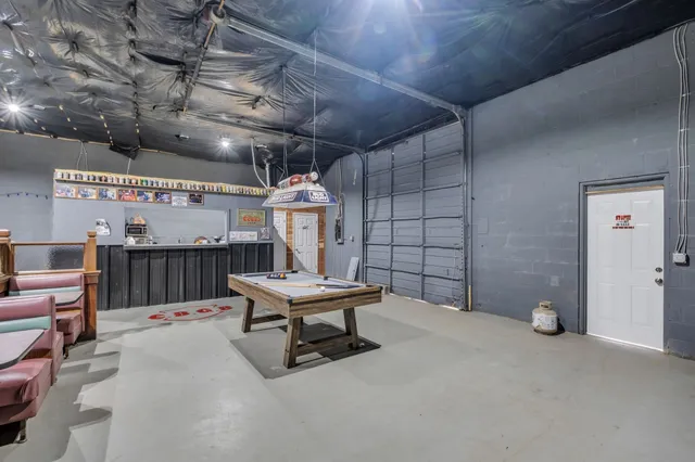 a view of a room with furniture