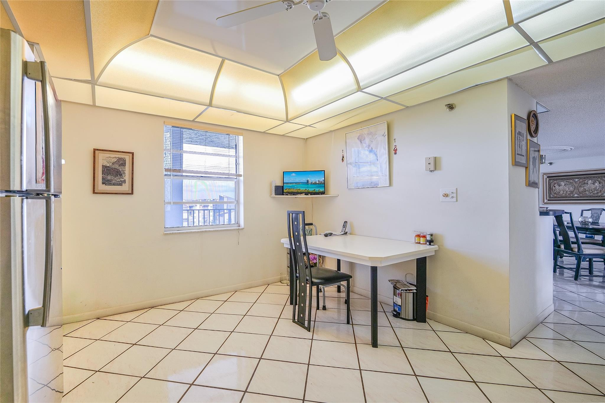 3910 Inverrary Boulevard, Unit 805B Lauderhill, FL 33319 - Photo 11 of 51 a view of a dining room with furniture