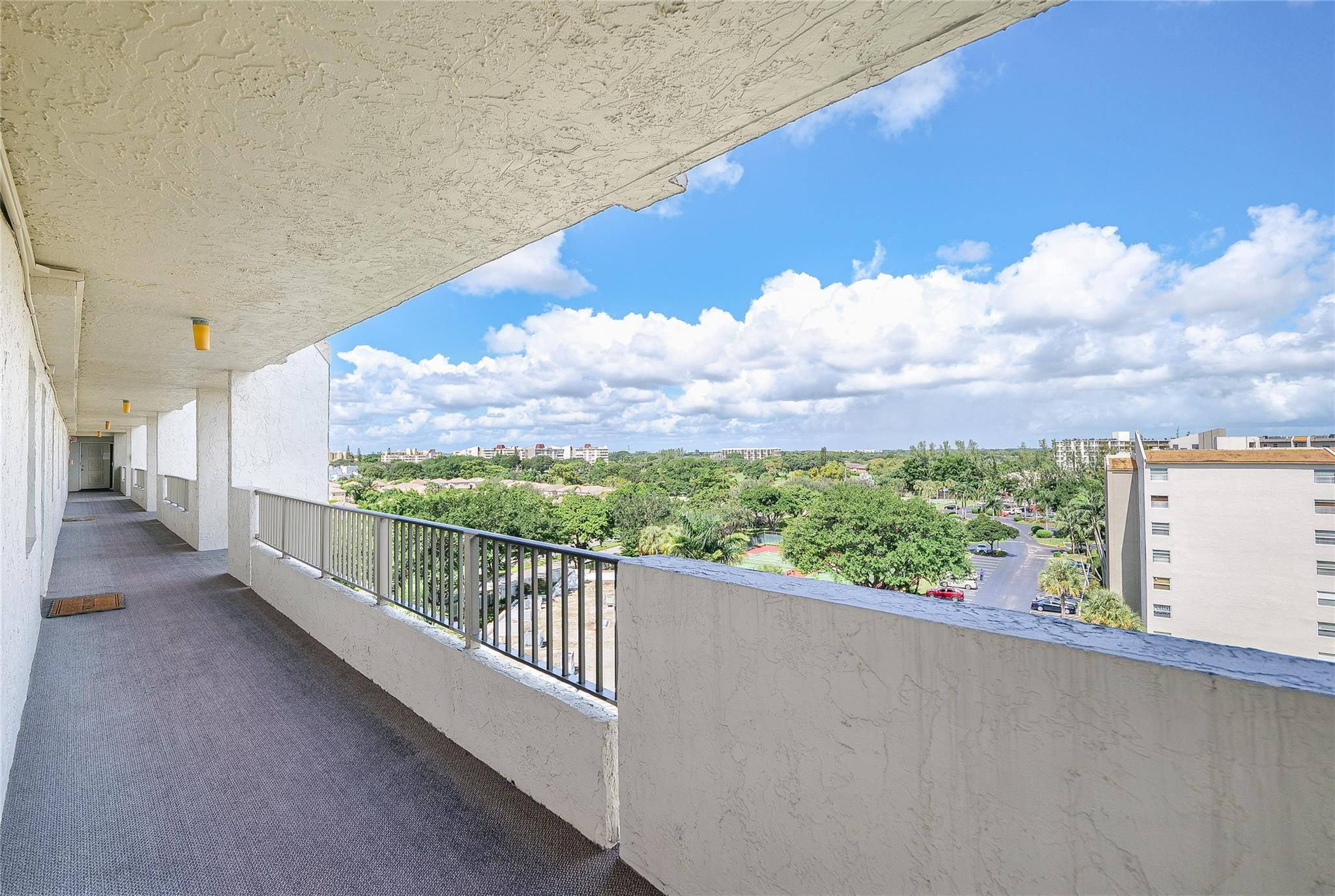 3910 Inverrary Boulevard, Unit 805B Lauderhill, FL 33319 - Photo 26 of 51 a view of a balcony with an outdoor seating