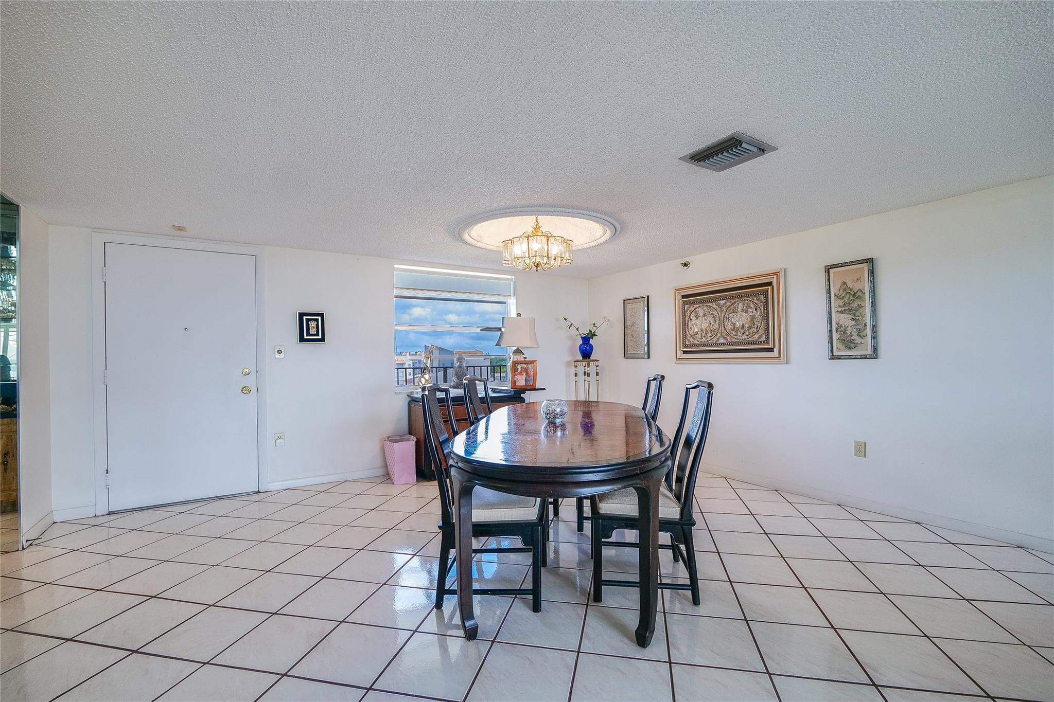 3910 Inverrary Boulevard, Unit 805B Lauderhill, FL 33319 - Photo 8 of 51 a view of a dining room with furniture