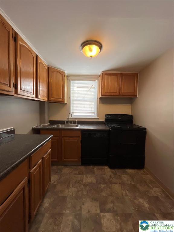 2280 Main Street, Unit 3 Bethlehem, PA 18017 - Photo 4 of 16 a kitchen with granite countertop a stove and a sink