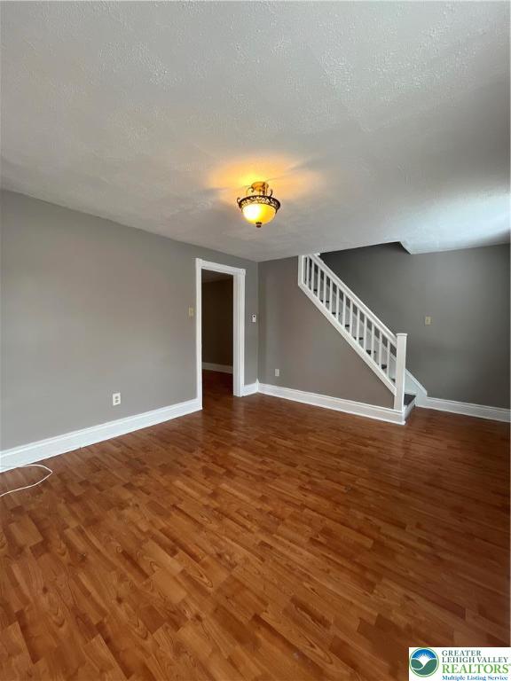 2280 Main Street, Unit 3 Bethlehem, PA 18017 - Photo 6 of 16 a view of an empty room with window and wooden floor