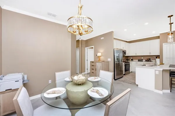 a living room with furniture rug and a window