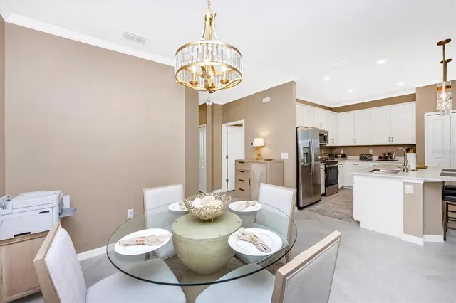 a living room with furniture rug and a window