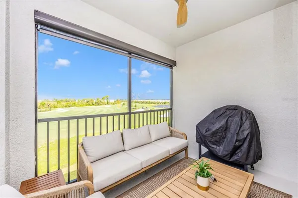 a bedroom with a bed and a lamp