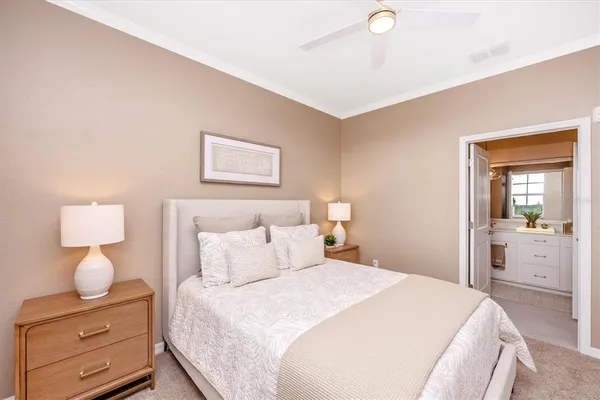 a bathroom with a sink vanity mirror and toilet