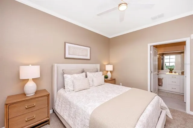 a bathroom with a sink vanity mirror and toilet