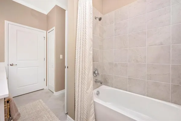 a front view of a building with a yard