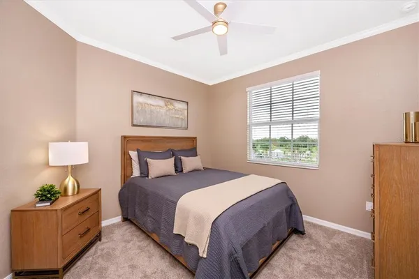 a building outdoor space with patio furniture and potted plants