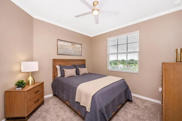 a building outdoor space with patio furniture and potted plants