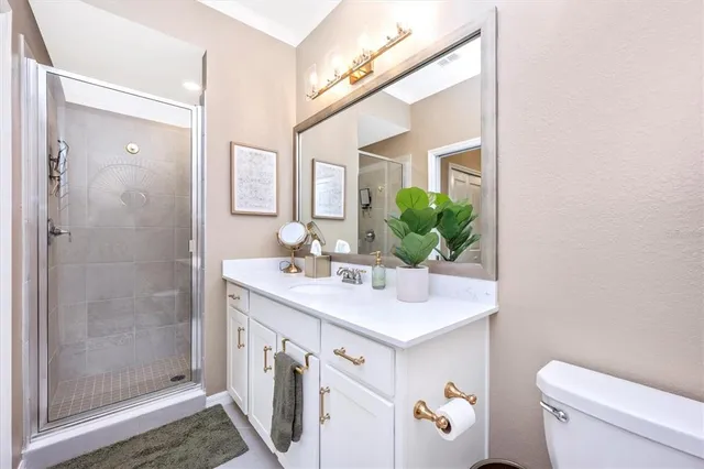 a view of a room with gym equipment and a large window