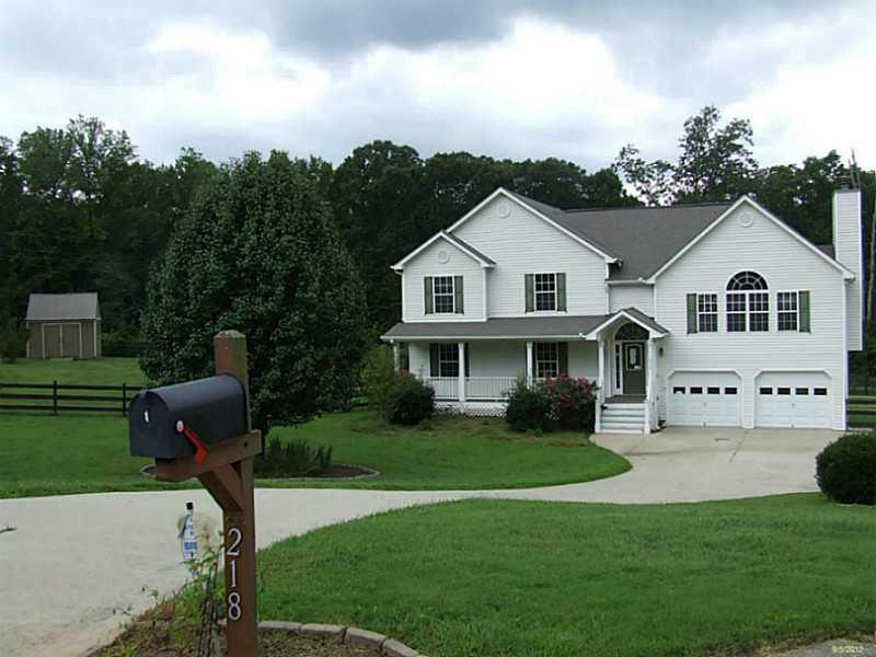218 Oakleaf Trail Ball Ground, GA 30107 - Photo 1 of 1 Exterior Front.