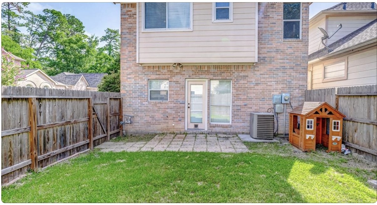 18927 Crescent Fountain Road Spring, TX 77388 - Photo 13 of 13 a view of a house with a yard and furniture