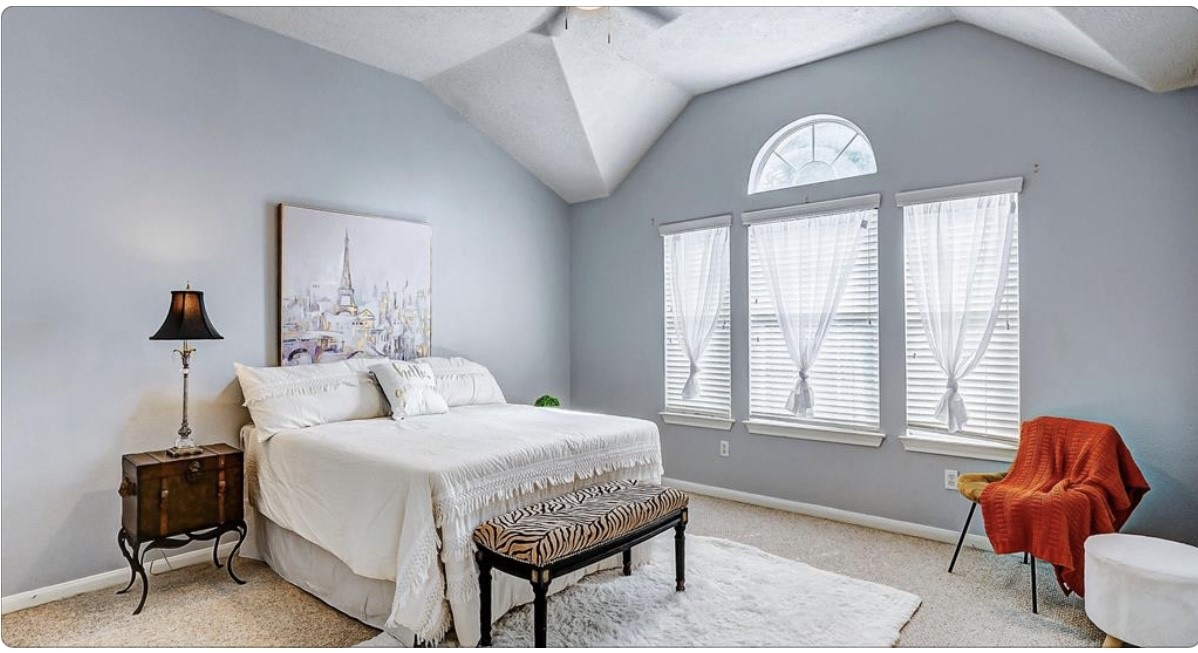 18927 Crescent Fountain Road Spring, TX 77388 - Photo 6 of 13 a bedroom with a bed and a window