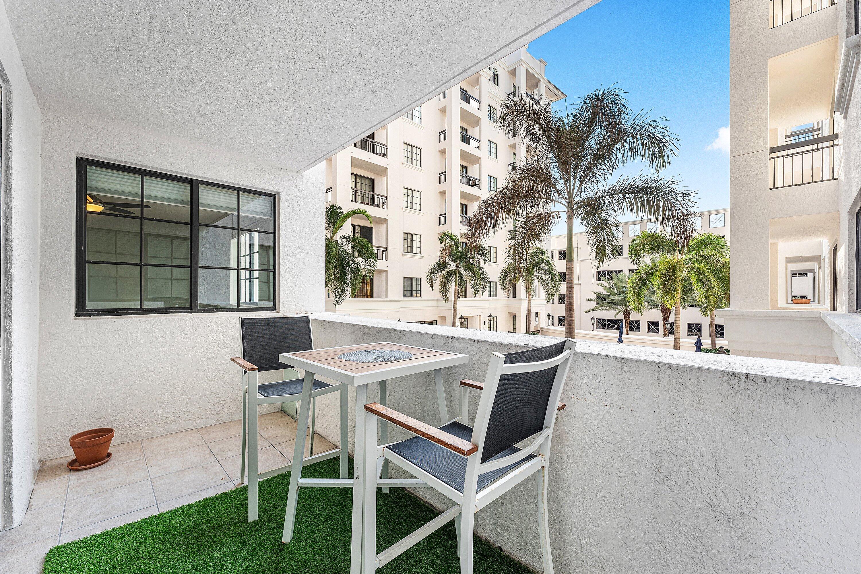 233 South Federal Highway, Unit 308 Boca Raton, FL 33432 - Photo 19 of 44 a view of a dining room with furniture and a window