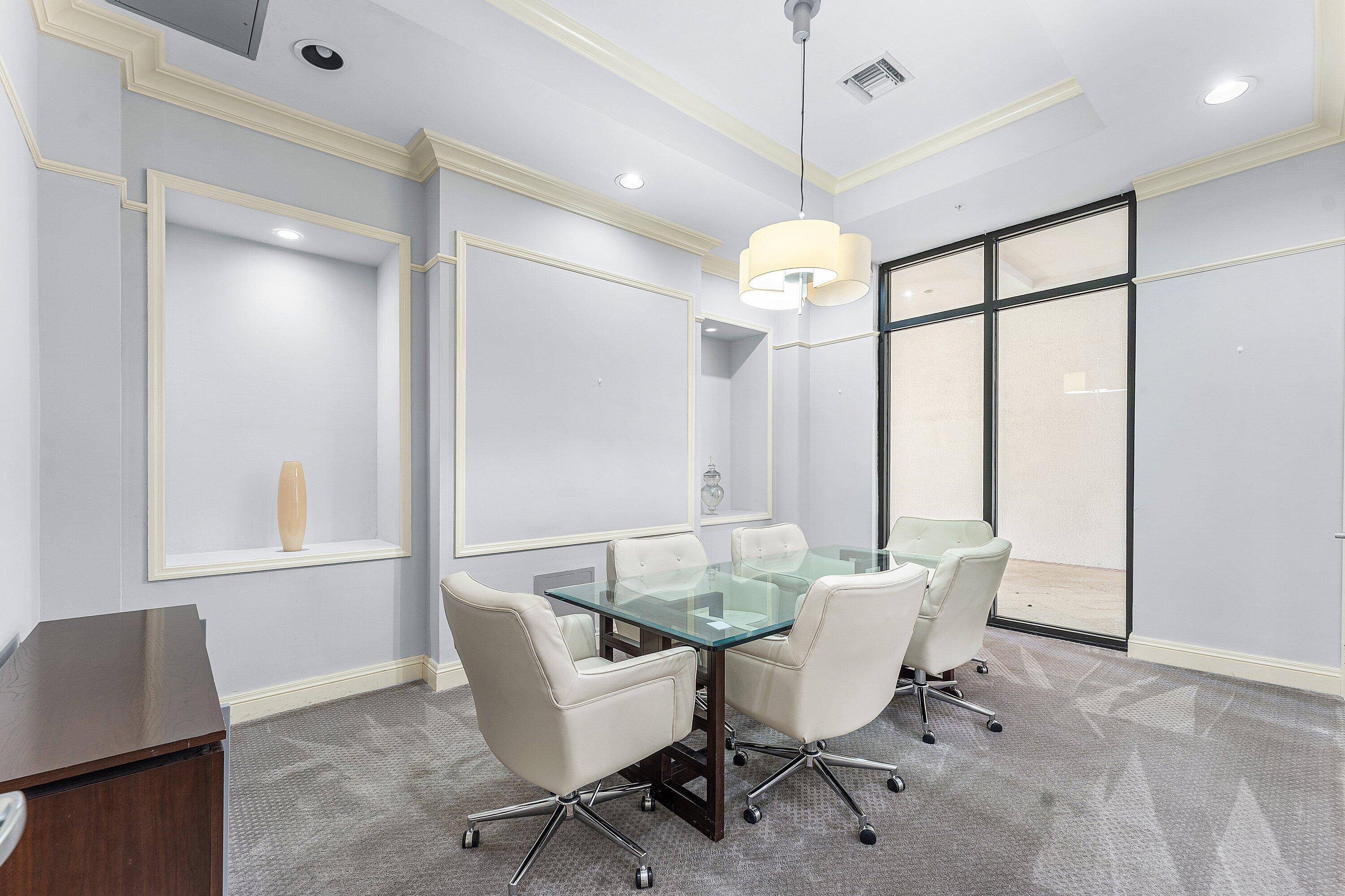 233 South Federal Highway, Unit 308 Boca Raton, FL 33432 - Photo 28 of 44 a dining room with furniture a chandelier and window