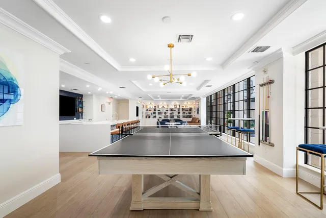 a view of kitchen and dining room with wooden floor