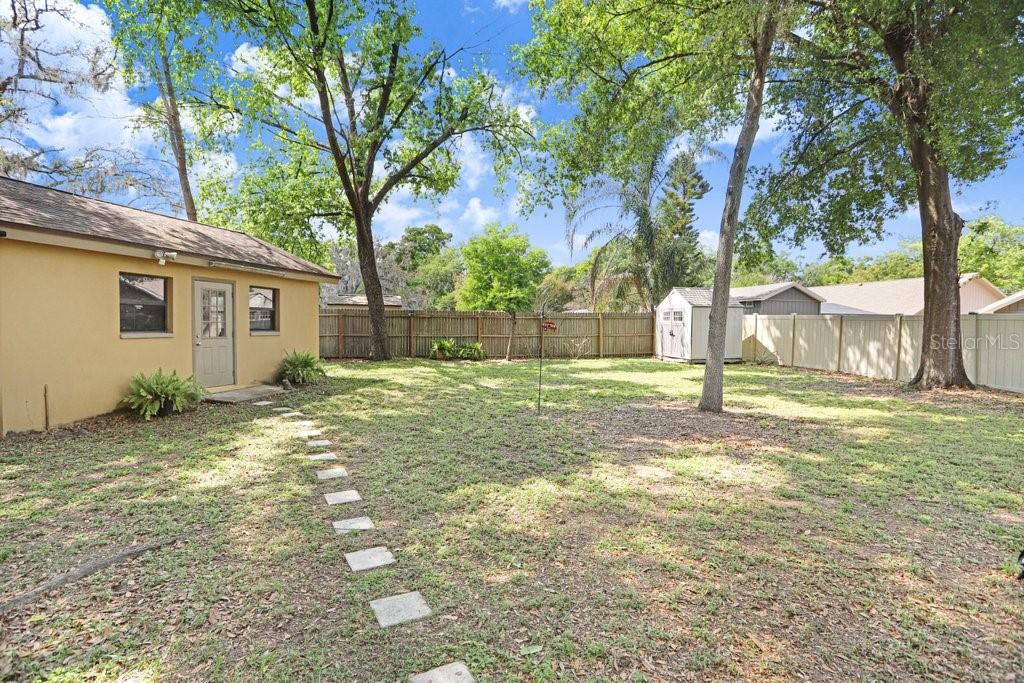 504 Triple Crown Court Seffner, FL 33584 - Photo 42 of 63 a view of a house with a yard